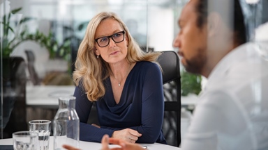 Woman-with-glasses-having-meeting